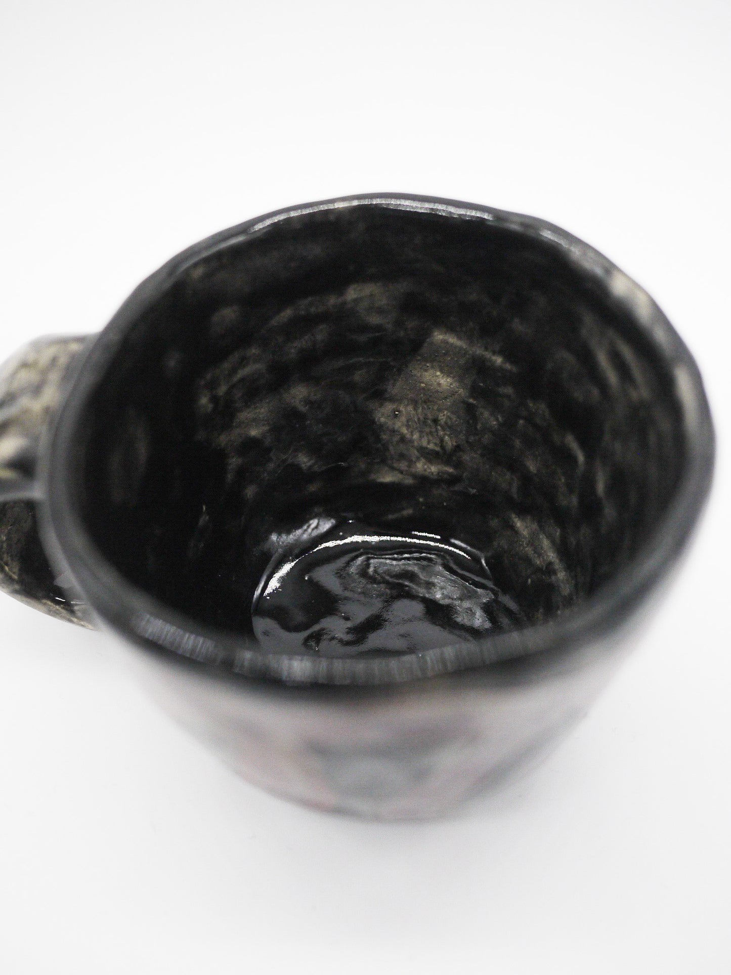 Satoko Kako / Black mug with guru guru